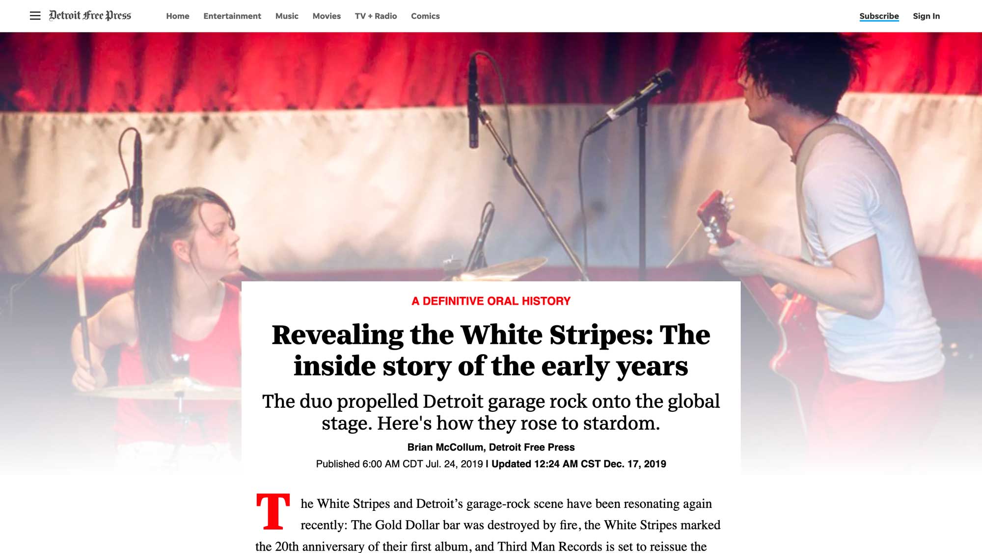 A notch topper with an image of band the White Stripes performing